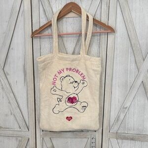 Divided Care Bears Cream Tote Bag
